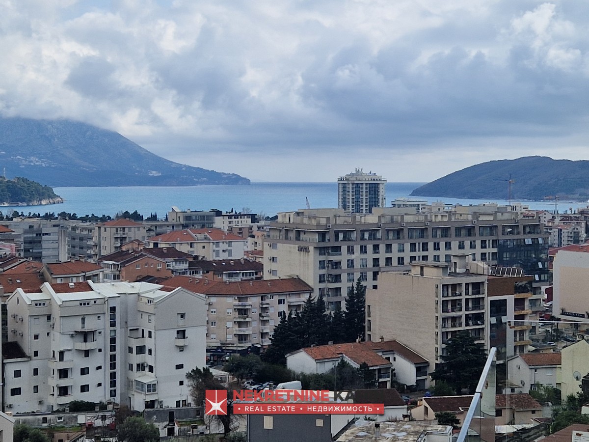 Two bedroom apartment with garage, new building, Budva